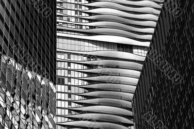 reflection on glass windows of tall buildings