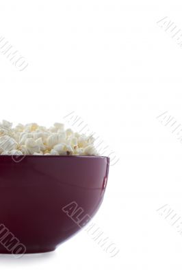 red bowl of popcorn
