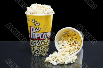 two cups of popcorn