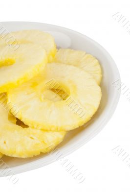 plate of pineapple slices