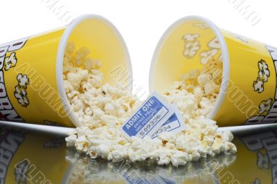 two tickets and spilled popcorn