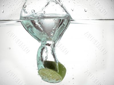 slice of lime immersed in water