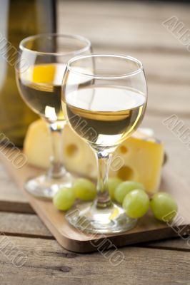 portrait of wine with grapes and cheese