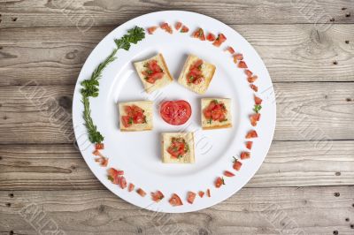 slices of bruschetta on white plate