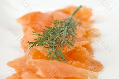slices of smoked salmon with dill