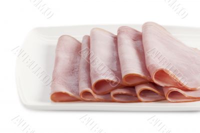 slices of ham on white plate