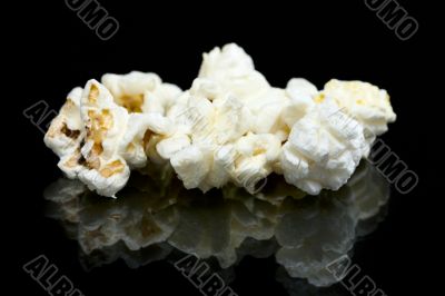 pieces of popcorn on the table