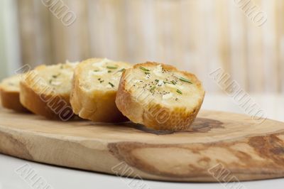 toasted baguette bread slices with garlic and pepper