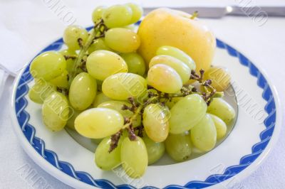 Sweet green grapes and apple 