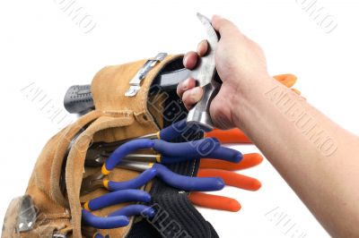 close up shot of a person holding hammer