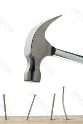 hammer and nail on wood