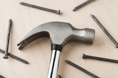 hand hammer and metal nails