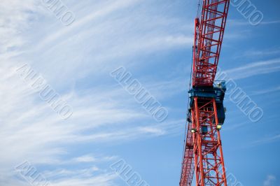 construction crane with blue sky in the background