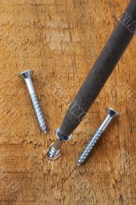 screwing a screw