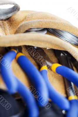 tools on a carpenters belt 