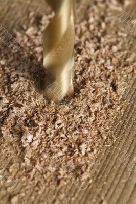 macro shot of drilling a wood