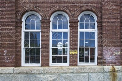 glass window on bricked wall