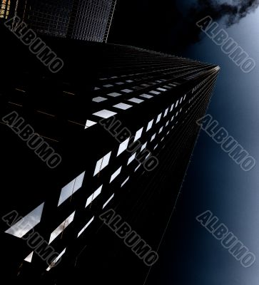 low angle shot of commercial building at night