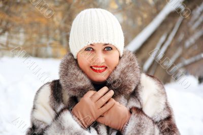 Beautiful young woman in winter coat
