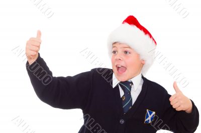 Happy smiling school boy gesturing thumbs up hands sign OK.