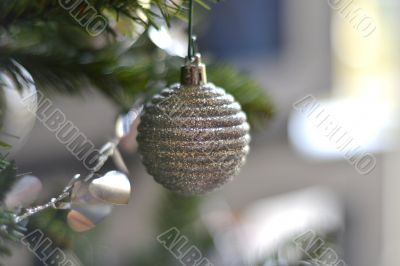 Beautiful christmas decorations hanging on christmas tree