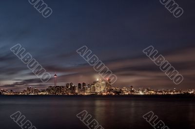 view of cityscape and sea at night toronto ontario canada