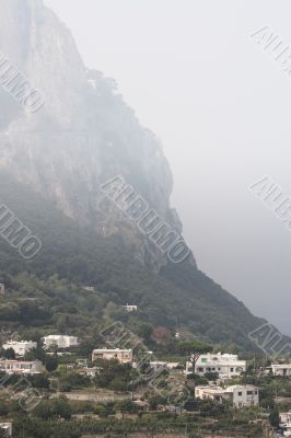 view of mountain with village below