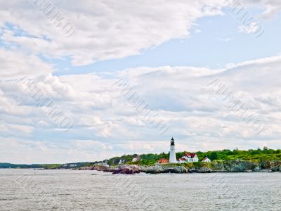 Lighthouse and Cloudy Sky 