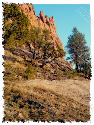 red rockface and blue sky