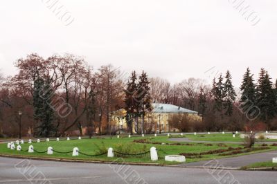 Old-time estate among autumn trees
