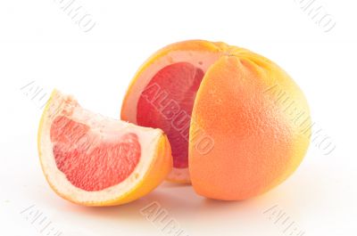 Fresh red grapefruit on white background