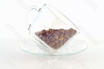 Glass cup with coffee beans