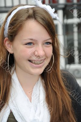 Laughing girl with braces