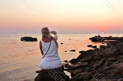 Woman on the beach at night
