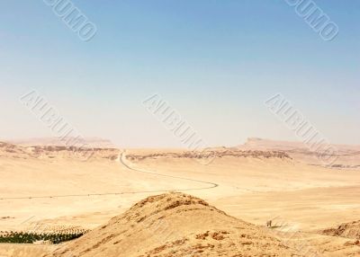 Road  among hills in desert