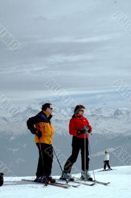 Skiers at mountain top