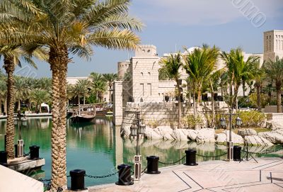 park with the artificial lake and the boat