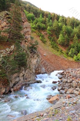 Waterfall in Caucasus mountains