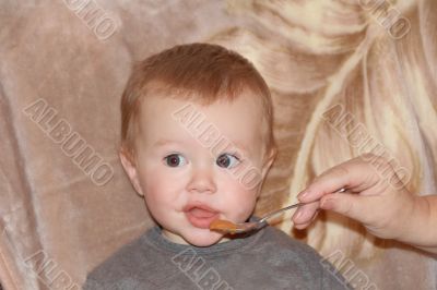 Cute eating baby 1 year