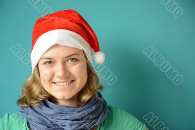 Laughing young Woman with Santa Hat