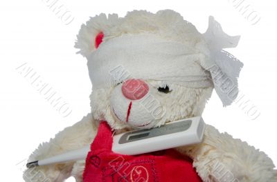 Teddy bear and a thermometer