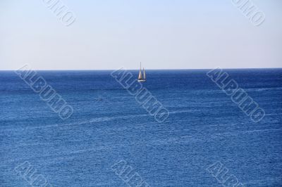 Ocean and white yacht