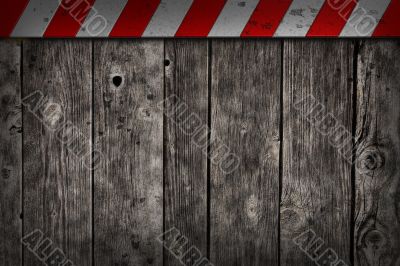 wooden background with warning bar