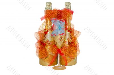 Wedding champagne bottles with a glass