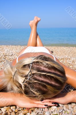 Sexual young girl Relaxing on a beach