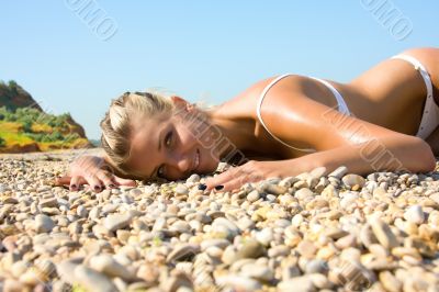 Sexual young girl Relaxing on a beach