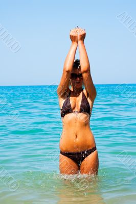 Beautiful Girl Relaxing on the Beach