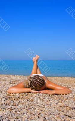 Sexual young girl Relaxing on a beach