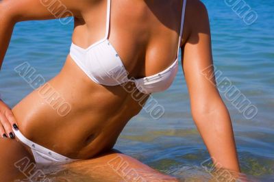 Sexual female body in the sea