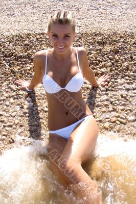 Beautiful Girl Relaxing on the Beach